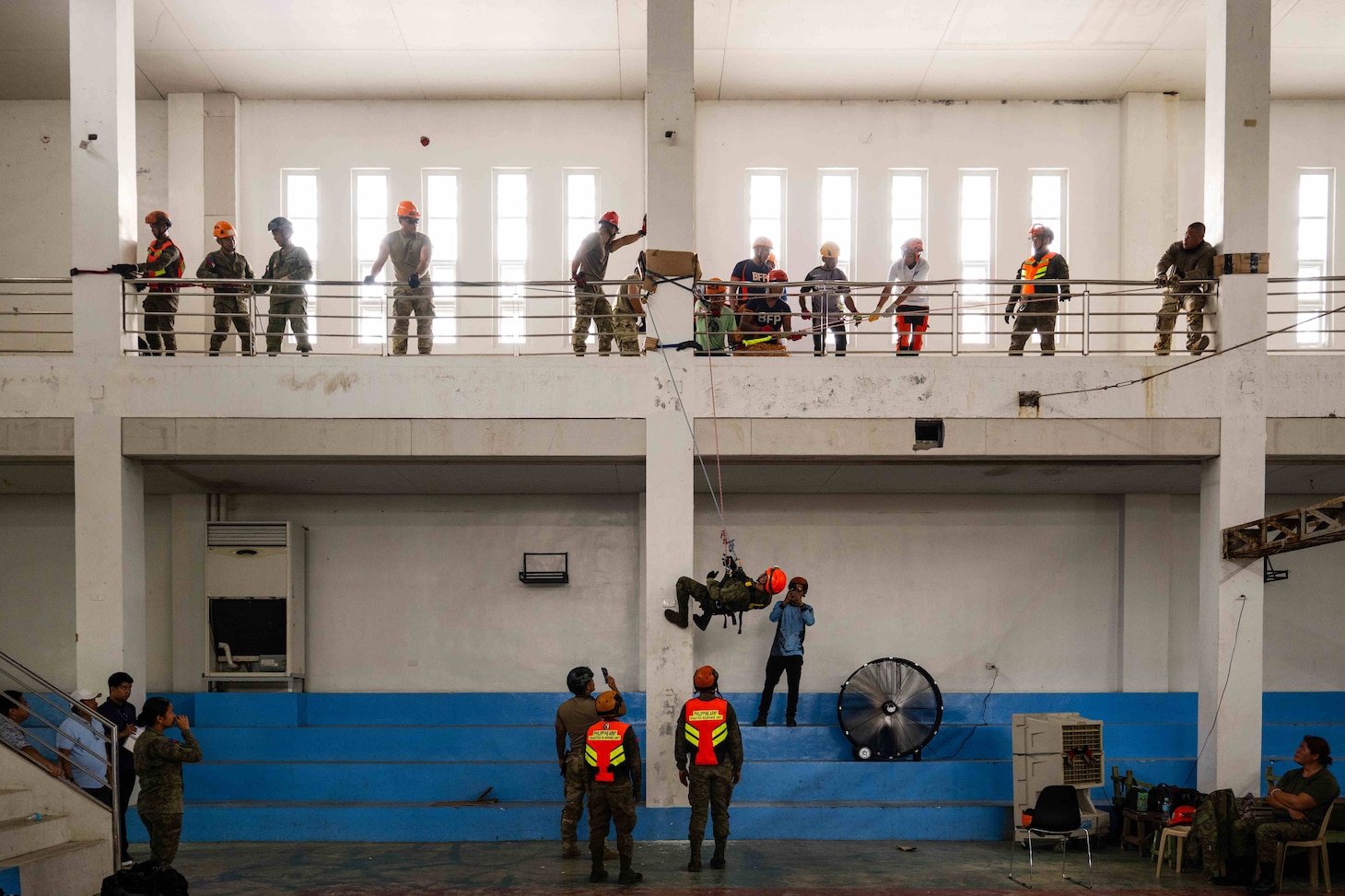 VIRAC, Philippines (June 5, 2025) – Hawaii National Guardsmen and personnel from the
Armed Forces of the Philippines instruct local emergency responders and civilian authorities on how to perform a controlled descent in Virac, Philippines, June 5, 2025. This effort is part of a two-week urban rescue training exercise supporting the humanitarian assistance and disaster response objectives of Pacific Partnership 2025. Now in its 21st iteration, Pacific Partnership series is the largest annual multinational humanitarian assistance and disaster management preparedness mission conducted in the Indo-Pacific. Pacific Partnership works collaboratively with host and partner nations to enhance regional interoperability and disaster response capabilities, increase security and stability in the region, and foster new and enduring friendships in the Indo-Pacific. (U.S. Navy photo by Mass Communication Specialist 2nd Class Jordan Jennings)