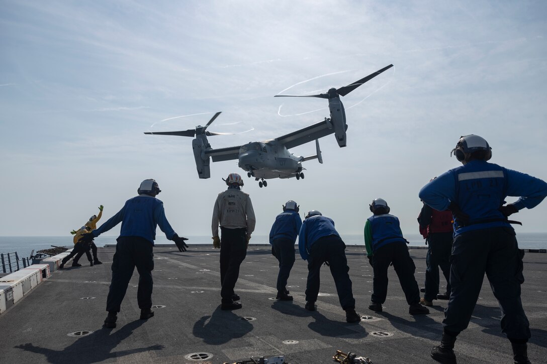 U.S. Sailors assigned to San Antonio-class amphibious transport dock ship USS New York (LPD 21) receive a Marine Corps MV-22B Osprey with Marine Medium Tiltrotor Squadron (VMM) 266 off the coast of eastern North Carolina, June 24, 2025. II Marine Expeditionary Force and U.S. Second Fleet, along with NATO Allies from the Netherlands and the United Kingdom, are conducting Atlantic Alliance 2025 (AA25). AA25 is the premier East Coast naval integration exercise, taking place along the eastern seaboard from North Carolina to Maine and focusing on the unique amphibious capabilities offered by the Navy-Marine Corps team. (U.S. Marine Corps photo by Lance Cpl. Mya Seymour)