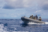 PACIFIC OCEAN - Members of a U.S. Coast Guard Law Enforcement Detachment and U.S. Navy Sailors assigned to the Arleigh Burke-class guided-missile destroyer USS Sampson (DDG 102) conduct small-boat operations and flight operations in the Pacific Ocean, June 22, 2025. Sampson is employed under U.S. Northern Command's maritime homeland defense authorities with a Coast Guard Law Enforcement Detachment embarked to enable maritime interdiction missions to prevent the flow of illegal drugs and other illegal activity. U.S. Northern Command is working together with the Department of Homeland Security to provide additional military forces and capabilities at the southern border. (Official U.S. Navy photo).