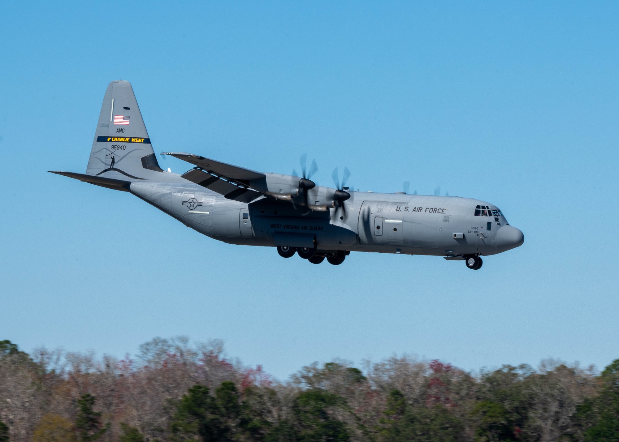 Photo of a C-130 Hercules landing.