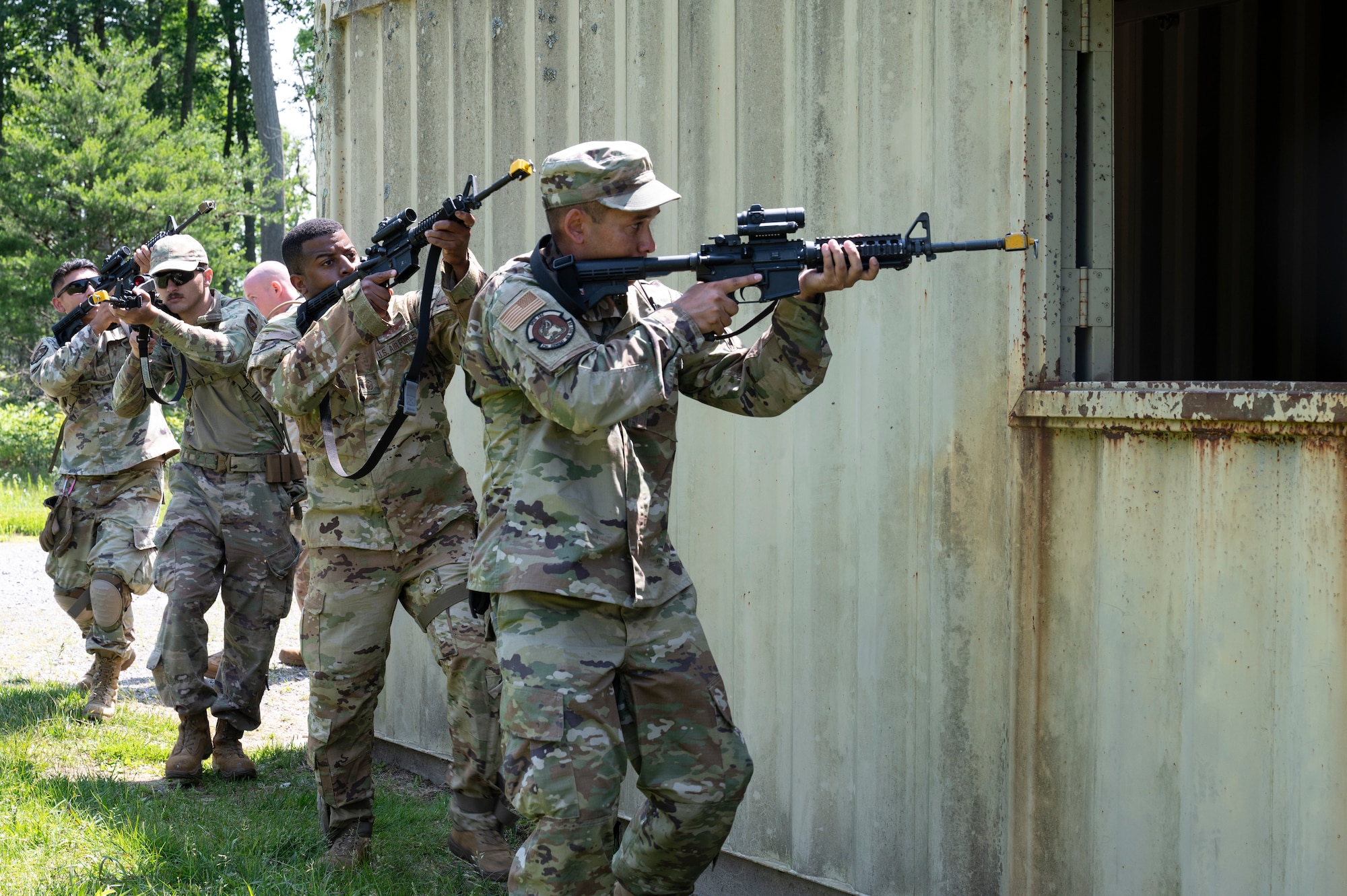 Airmen conduct weapons training outside
