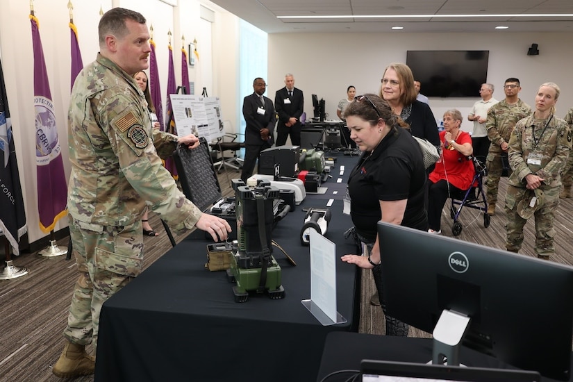 U.S. Air Force MSgt Timothy Lyons, Joint CBRN Program Manager, demonstrates radiological and nuclear defense capabilities for participants during Aberdeen Proving Ground’s “Behind the Gate” tour in celebration of the U.S. Army’s 250th anniversary.