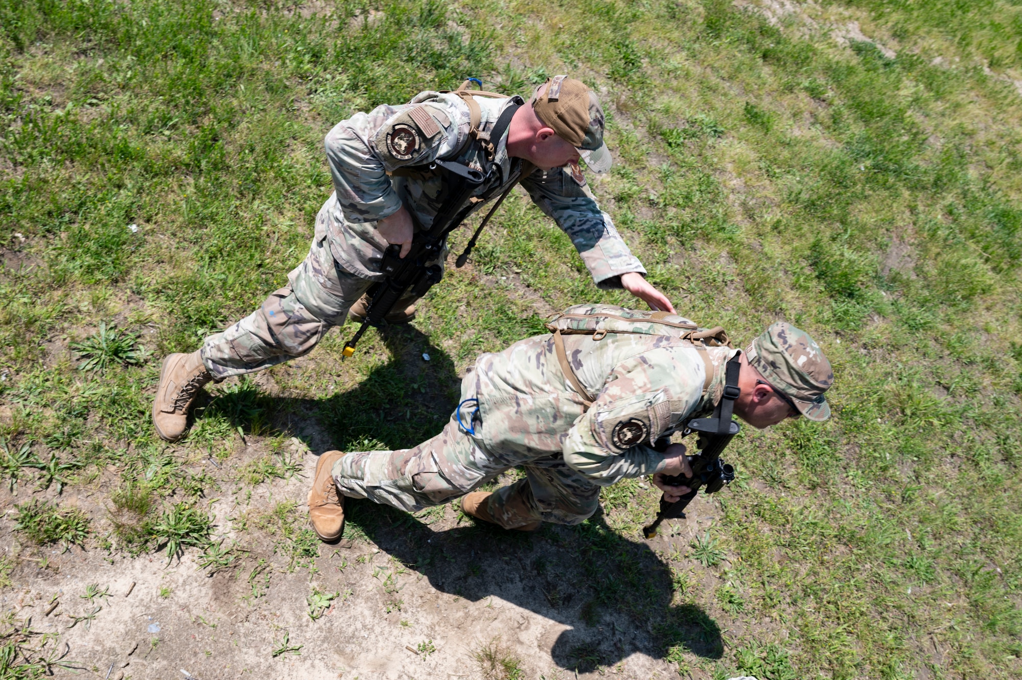 Airmen conduct weapons training outside