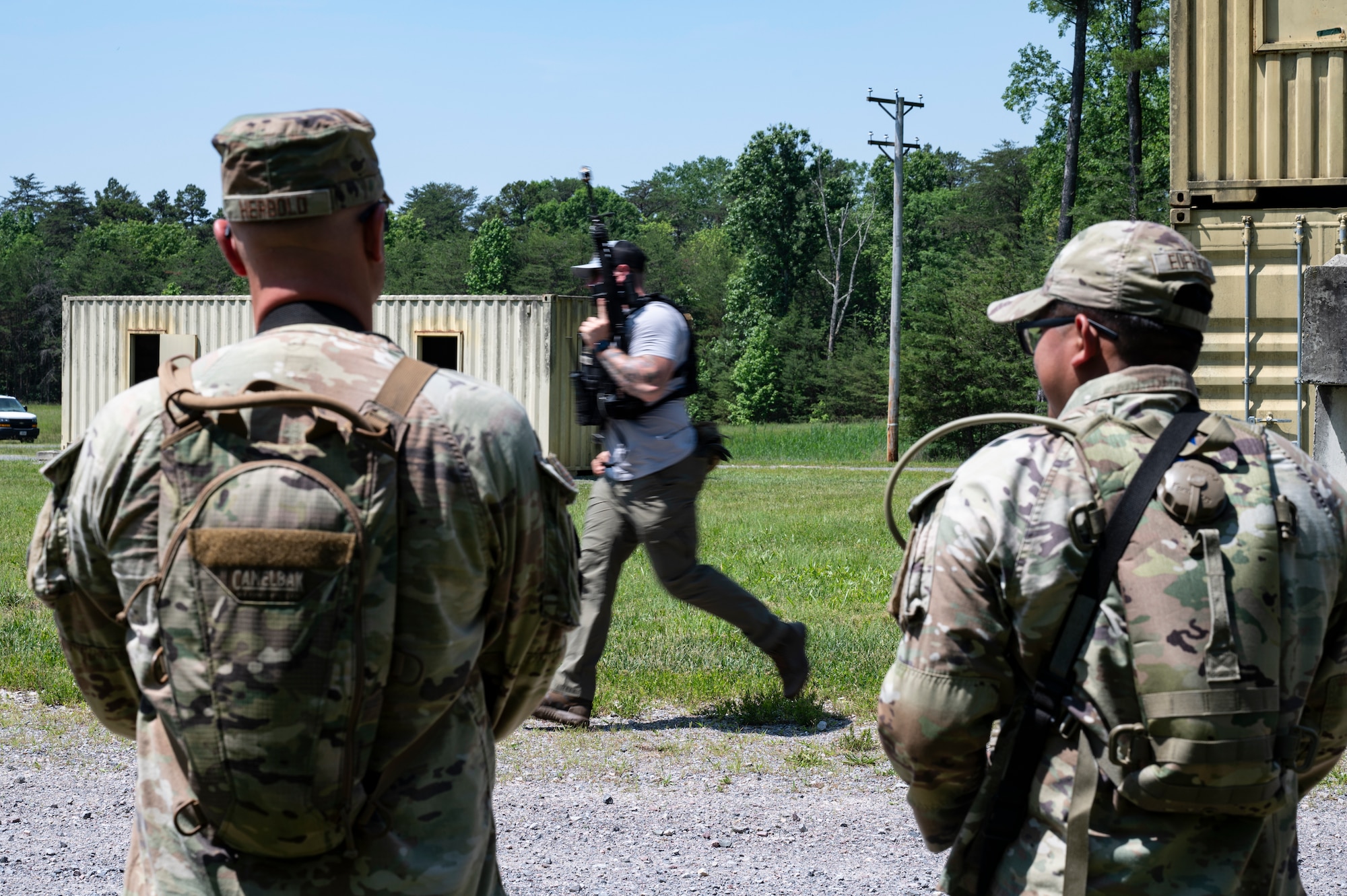 Airmen conduct weapons training outside