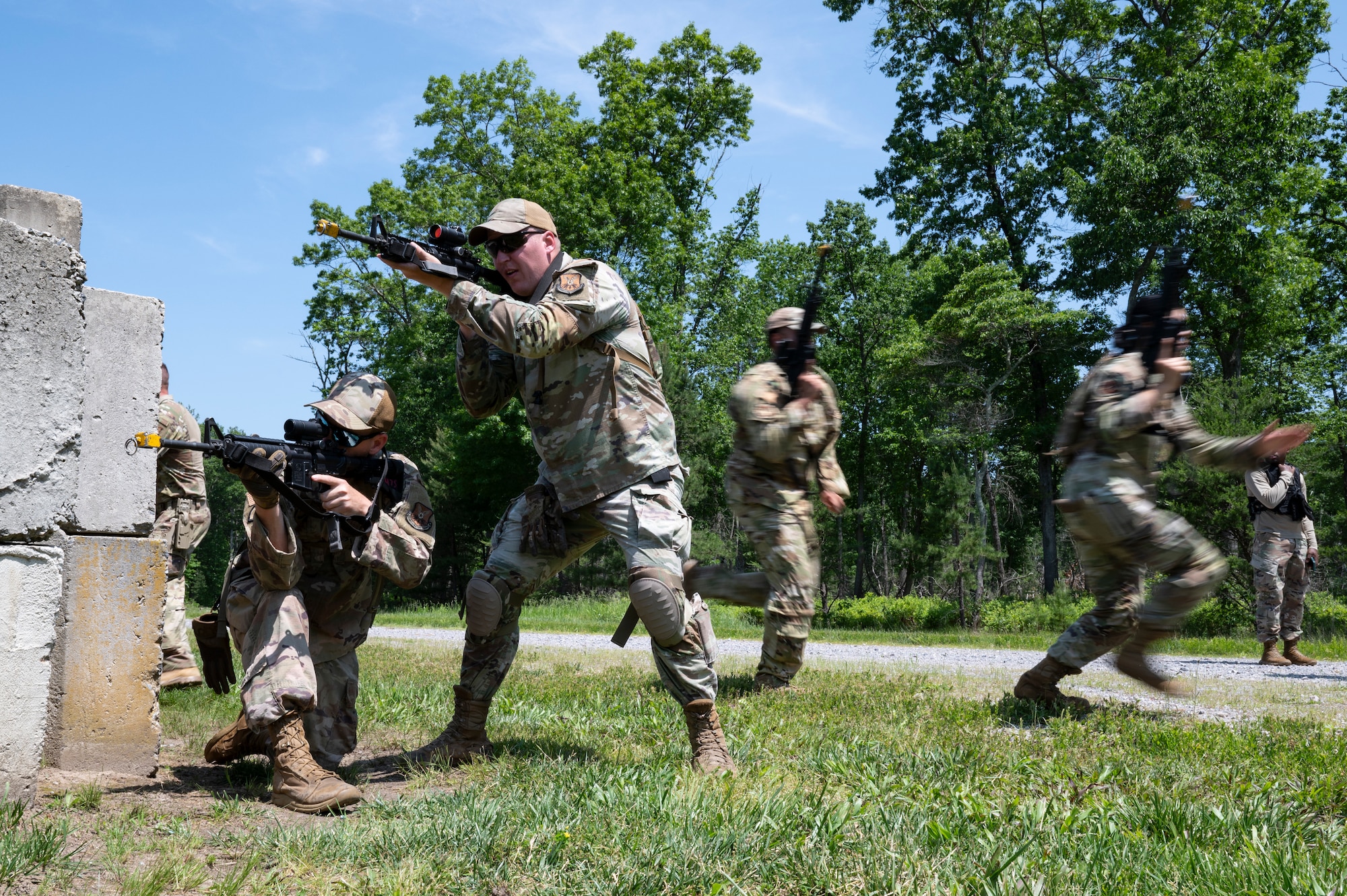 Airmen conduct weapons training outside