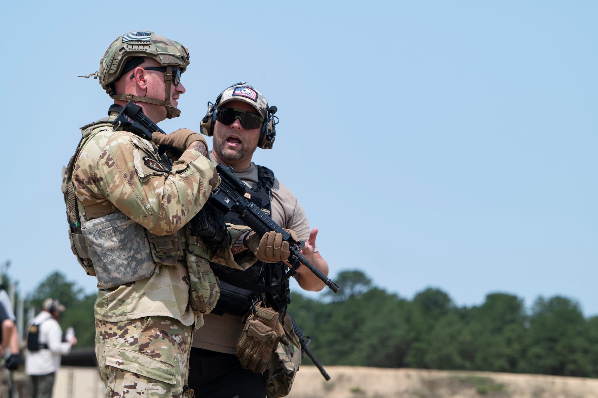 Airmen conduct weapons training outside