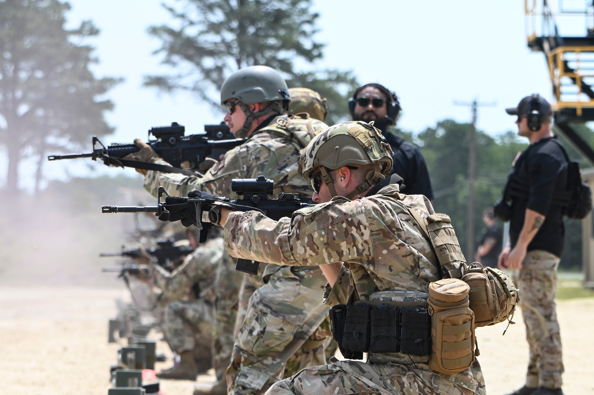 Airmen conduct weapons training outside