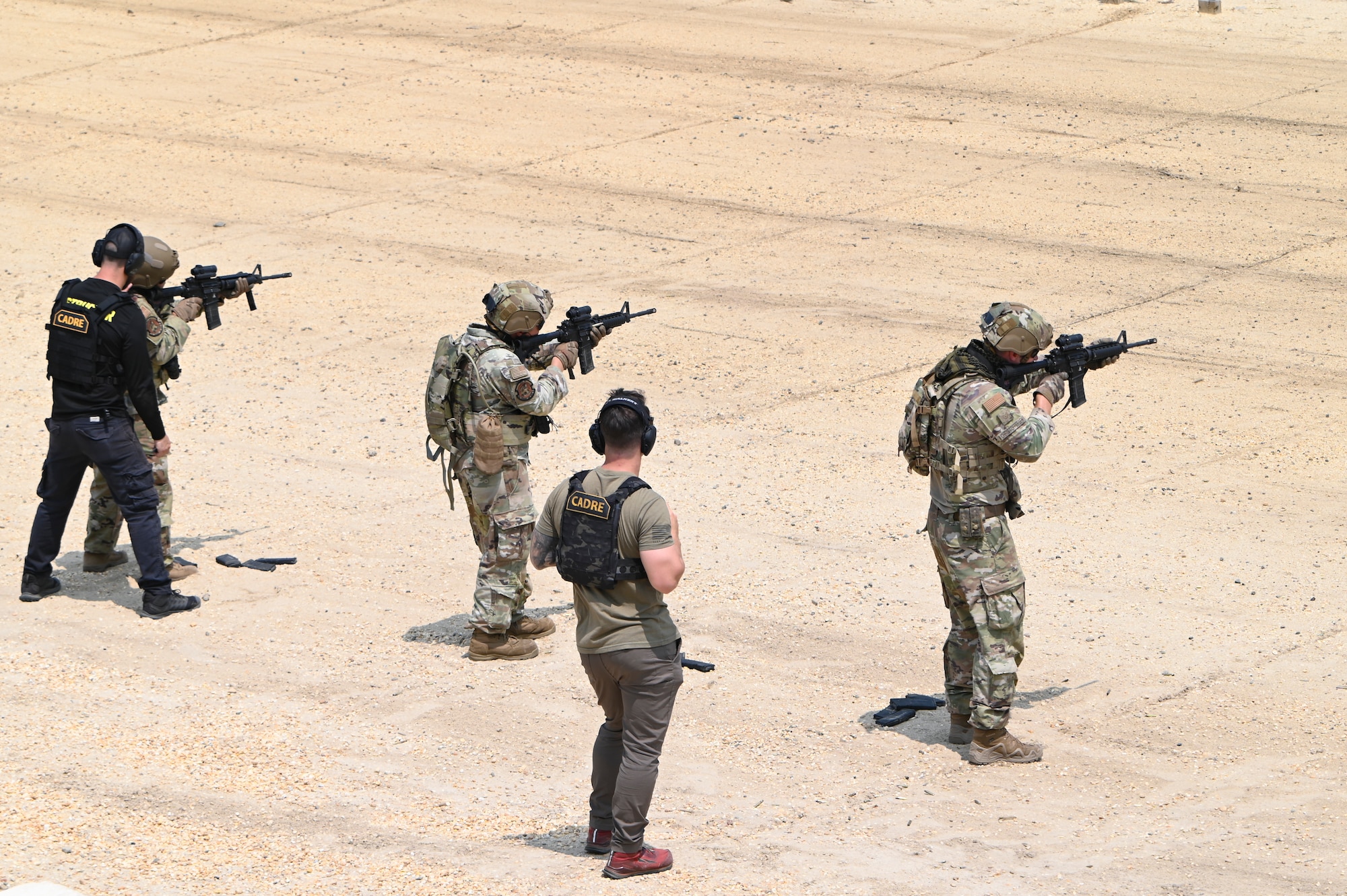 Airmen conduct weapons training outside