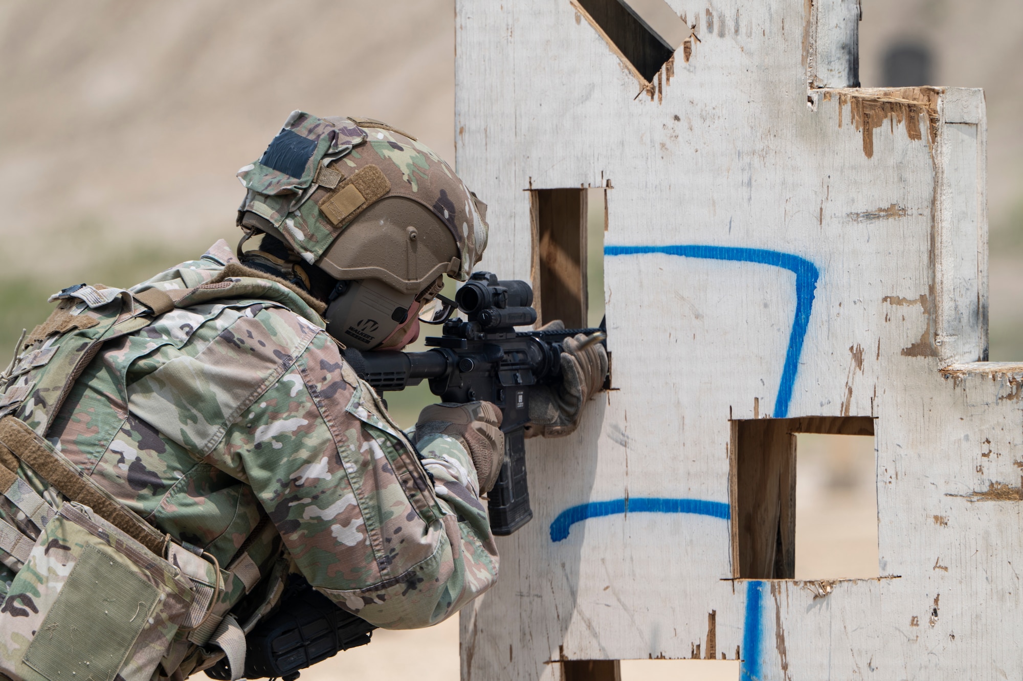 Airmen conduct weapons training outside