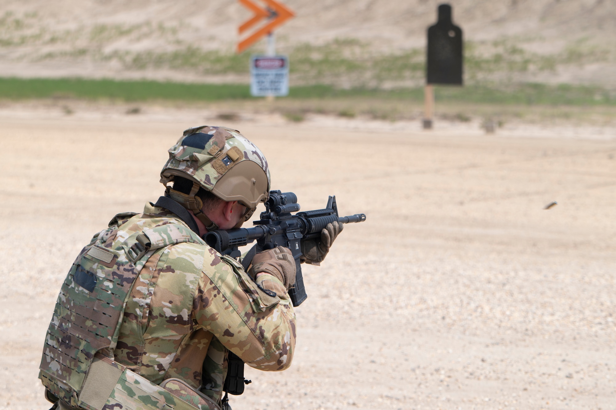 Airmen conduct weapons training outside