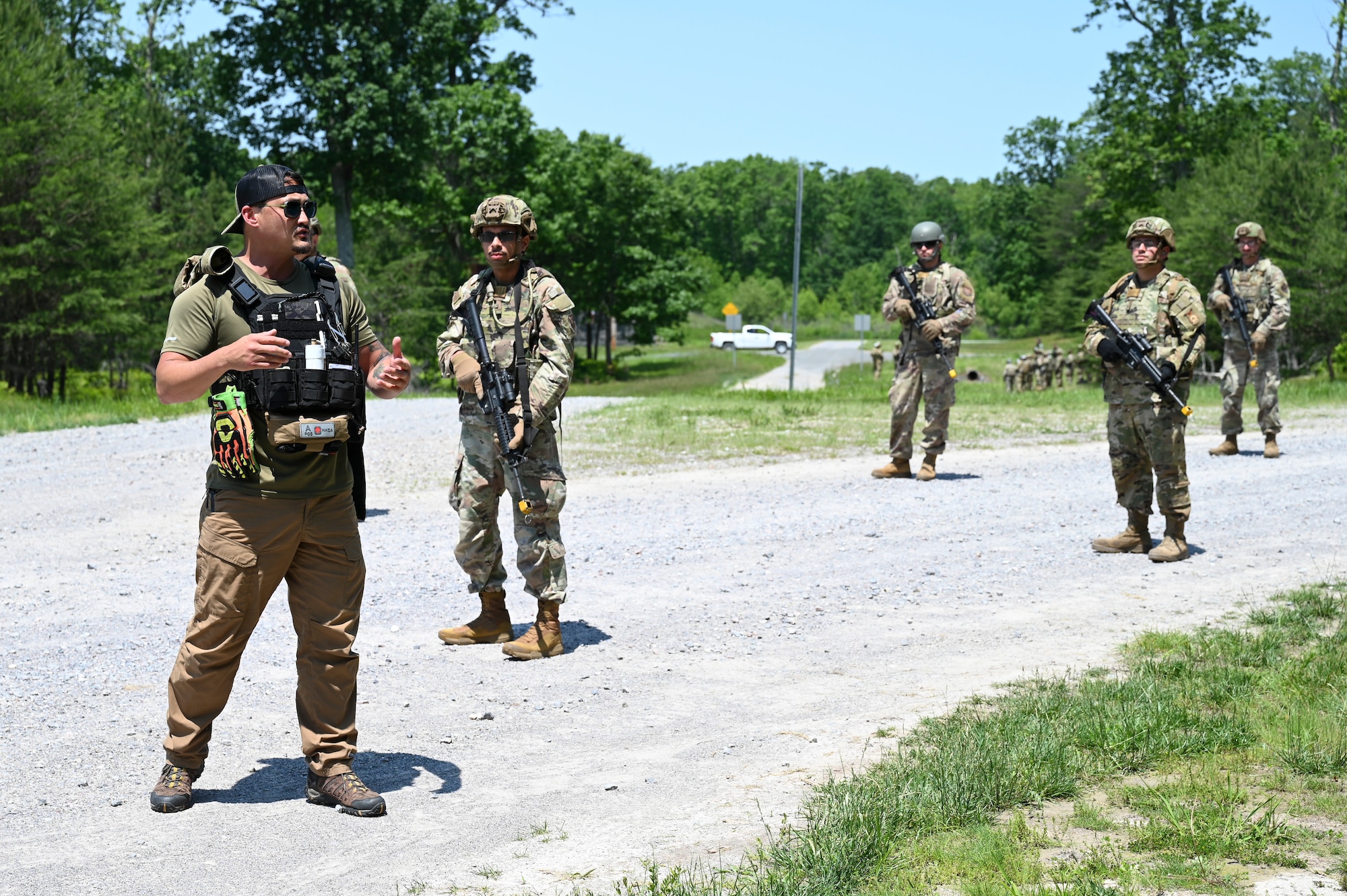 Airmen conduct weapons training outside