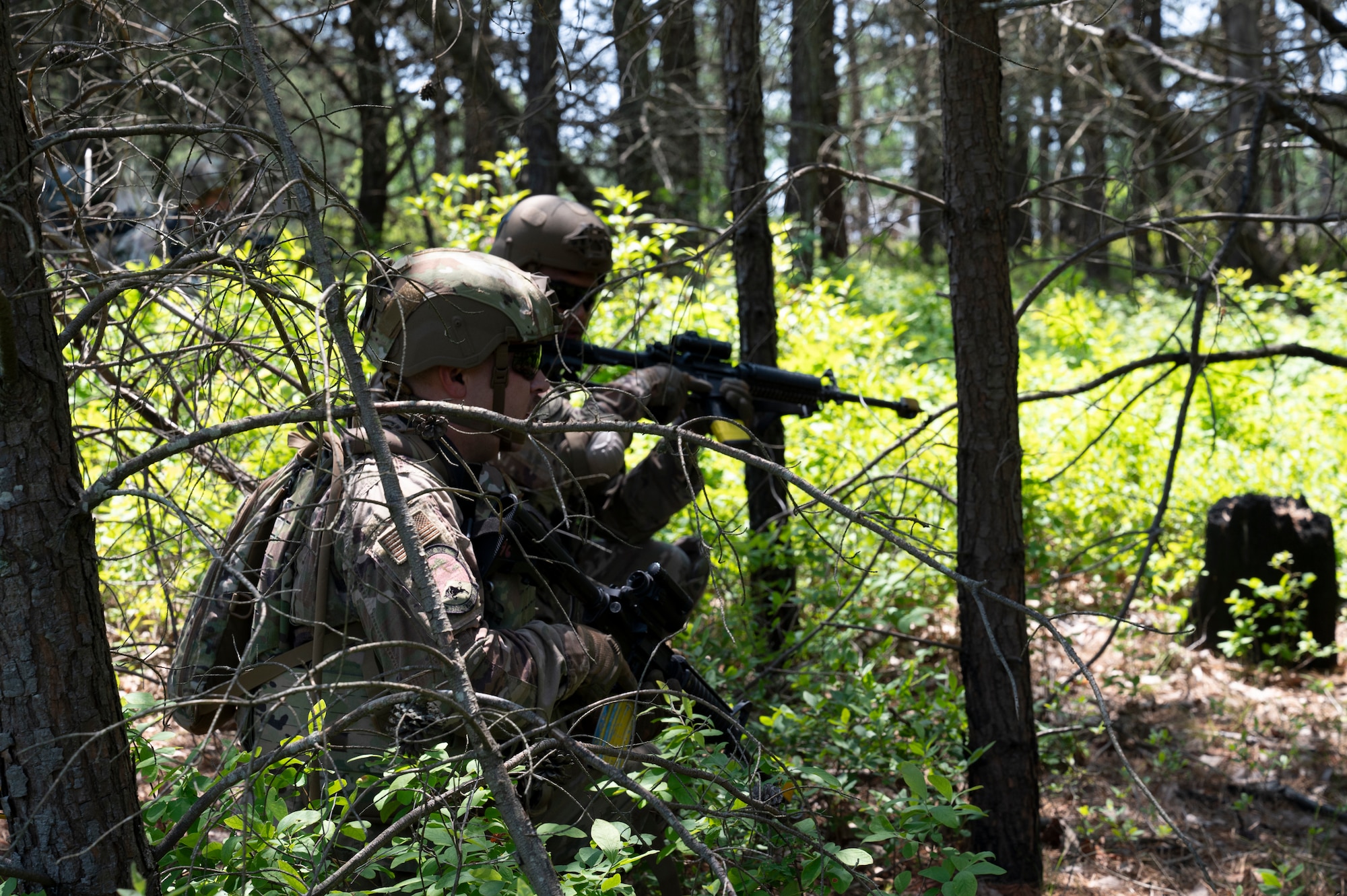 Airmen conduct weapons training outside