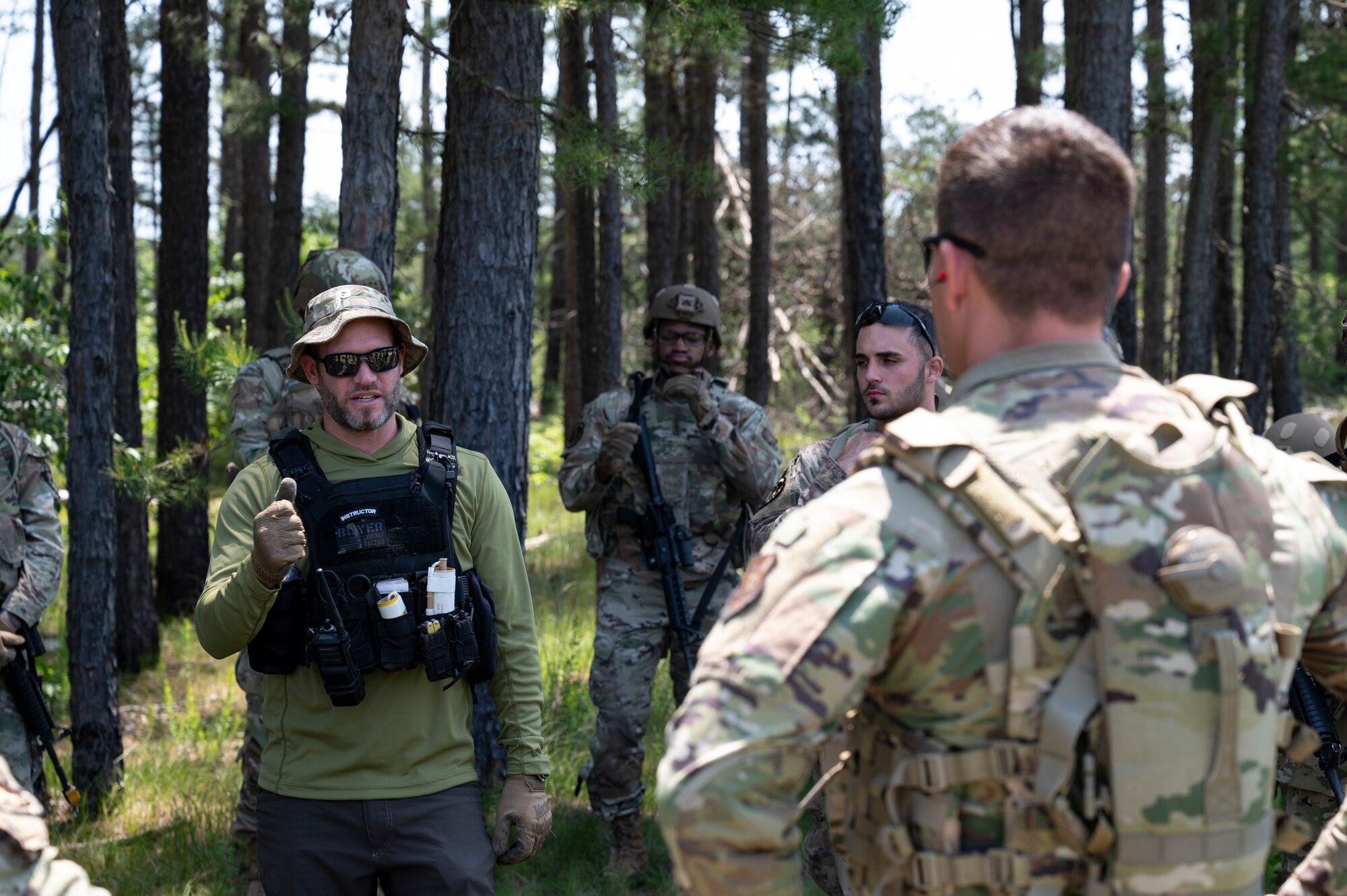 Airmen conduct weapons training outside