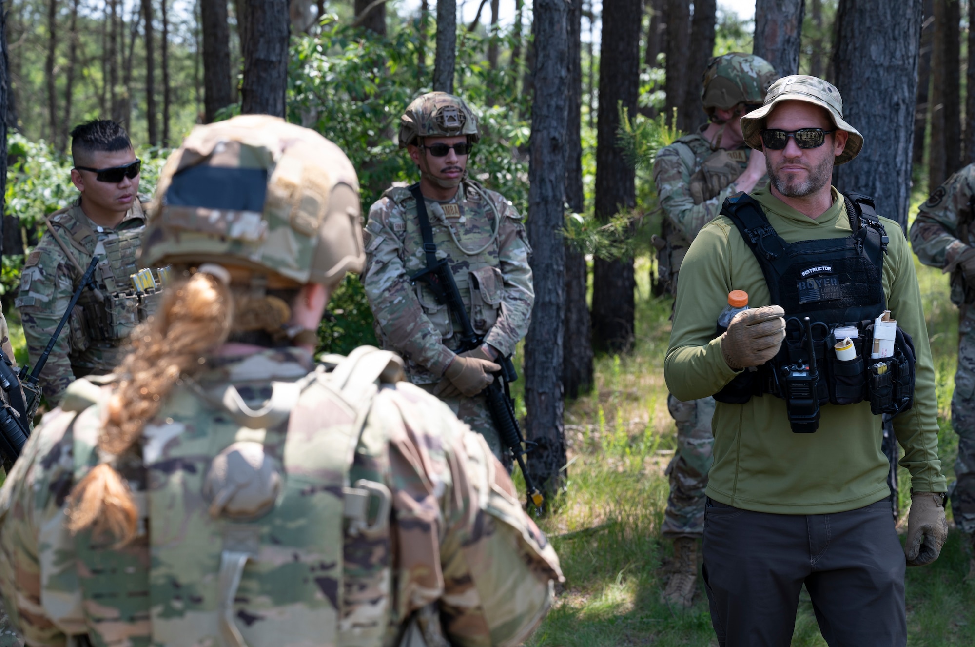 Airmen conduct weapons training outside