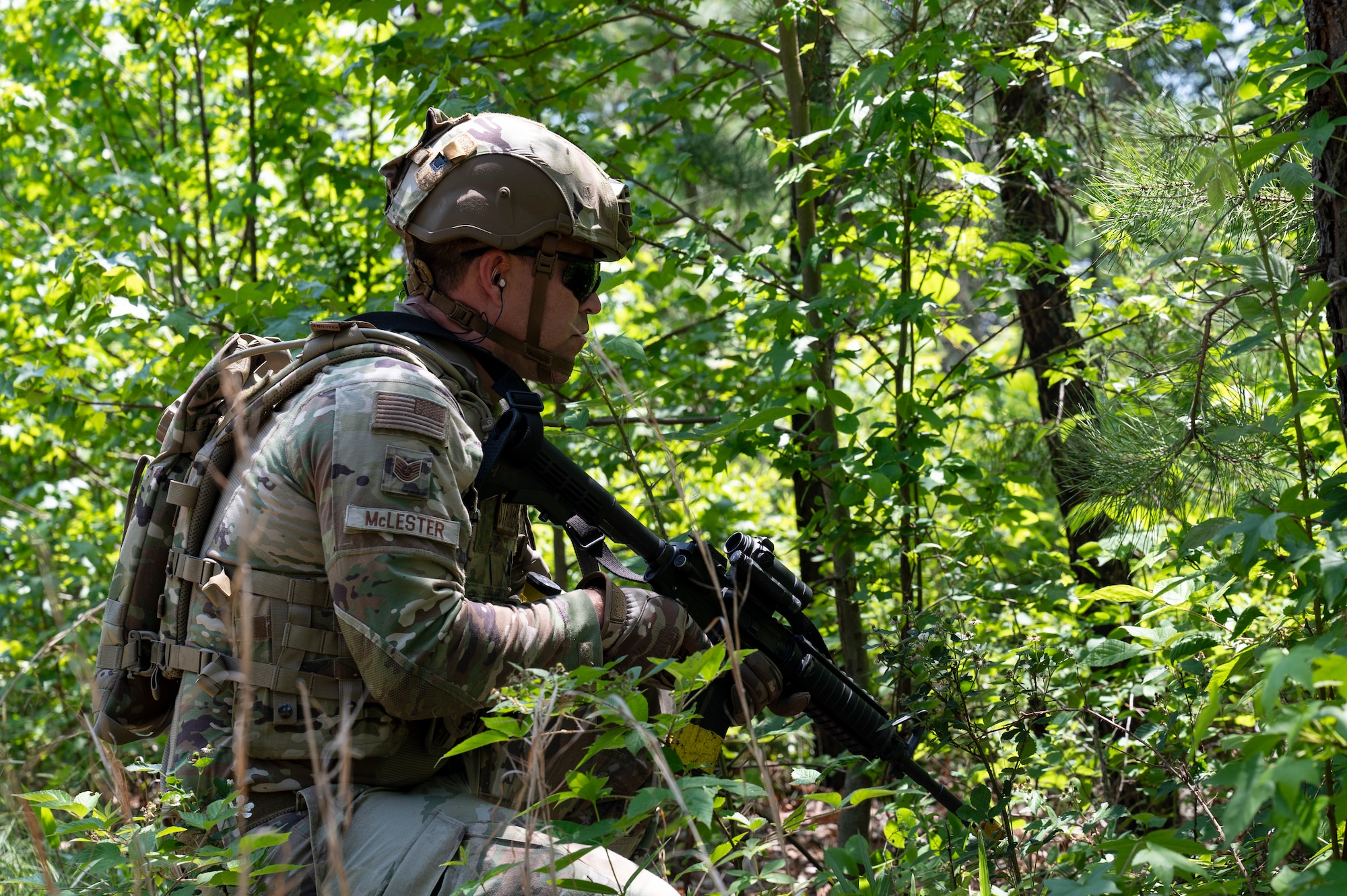 Airmen conduct weapons training outside