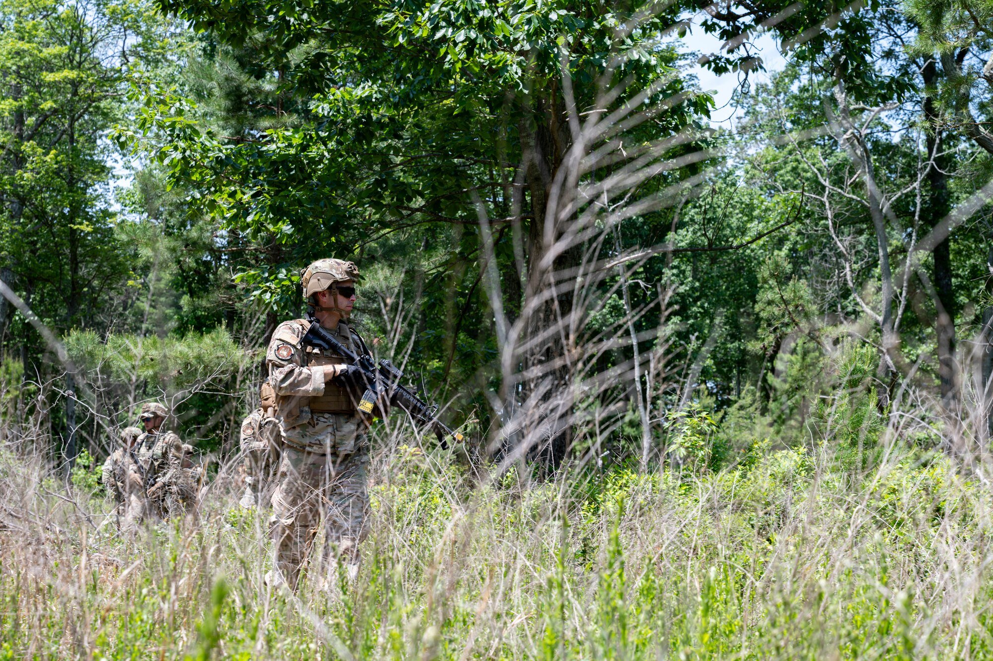 Airmen conduct weapons training outside