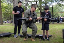 U.S. Marine Corps Lance Cpl. Andrew Barker, a combat engineer, assigned to Chemical Biological Incident Response Force, demonstrates how to use a search cam 3000 to New York City residents during Fleet Week New York 2025 at Eisenhower Park, East Meadow, New York City, May 24, 2025. America’s Navy and Marine Corps celebrate 250 years of defending American’s freedom and prosperity. Fleet Week New York 2025 pays tribute to the proud legacy and continued service of the Navy, Marine Corps, and Coast Guard protecting our interests on, below, and above the seas. (U.S. Marine Corps photo by Lance Cpl. Amy Espinoza)