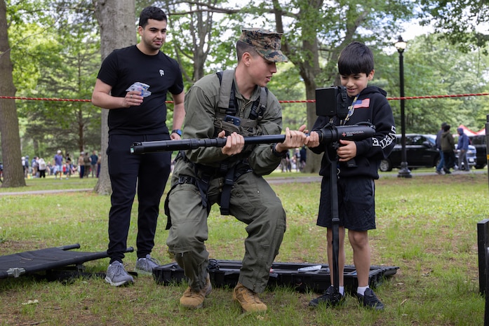 U.S. Marine Corps Lance Cpl. Andrew Barker, a combat engineer, assigned to Chemical Biological Incident Response Force, demonstrates how to use a search cam 3000 to New York City residents during Fleet Week New York 2025 at Eisenhower Park, East Meadow, New York City, May 24, 2025. America’s Navy and Marine Corps celebrate 250 years of defending American’s freedom and prosperity. Fleet Week New York 2025 pays tribute to the proud legacy and continued service of the Navy, Marine Corps, and Coast Guard protecting our interests on, below, and above the seas. (U.S. Marine Corps photo by Lance Cpl. Amy Espinoza)