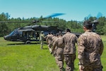 During Exercise Regional Cooperation 25 (RC 25), Mongolian partners board a UH-60 Black Hawk at Camp Edwards, Massachusetts, on June 24, 2025. RC 25 is an annual, multinational U.S. Central Command-sponsored command-post and field training exercise conducted by National Guard units in partnership with Central and South Asian nations.
