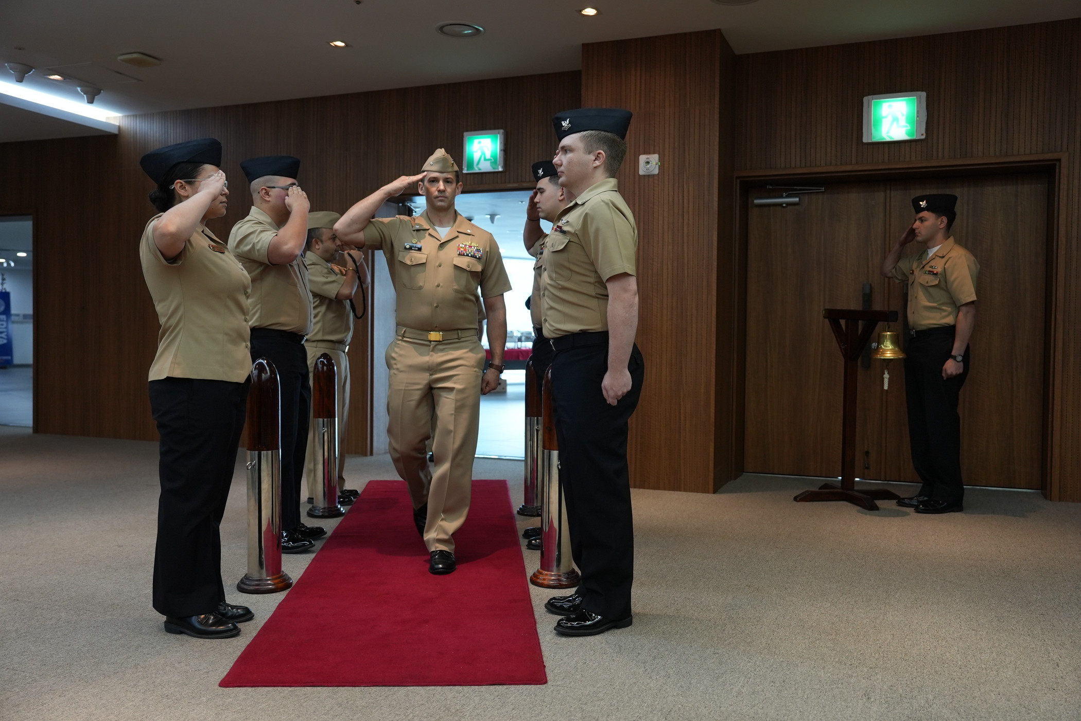 Cmdr. Patrick J. Moore, outgoing commanding officer of Busan, South Korea-based Military Sealift Command Office -Korea, arrives at the change of command ceremony at the United Nations Peace Memorial Hall in Busan, June 17, 2025.