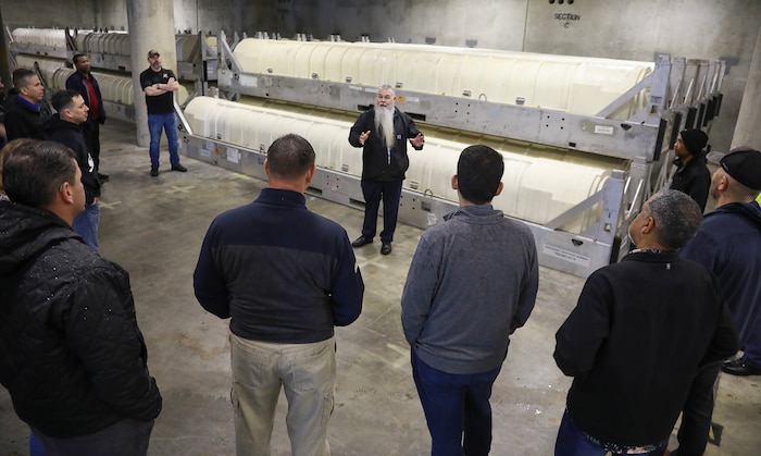 Magazine Product Manager Scott Wilson explains the use of the magazine storage system during a training opportunity at NWS Yorktown, Virginia, May 22, 2025.