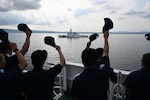 Japan Coast Guard members aboard the Japan Coast Guard Patrol Vessel Asanagi (PLH-43) wave to the Legend-class U.S. Coast Guard Cutter Stratton (WMSL 752) following a trilateral search and rescue exercise with U.S., Japan and Philippine Coast Guards in Kagoshima, June 20, 2025. Stratton is deployed and assigned to Destroyer Squadron (DESRON) 15, the Navy’s largest DESRON and the U.S. 7th Fleet’s principal surface force. Stratton is deployed to the Indo-Pacific to advance relationships with ally and partner nations to build a more secure and prosperous region with unrestricted, lawful access to the maritime commons. (U.S. Coast Guard photo by Senior Chief Petty Officer Matthew S. Masaschi)