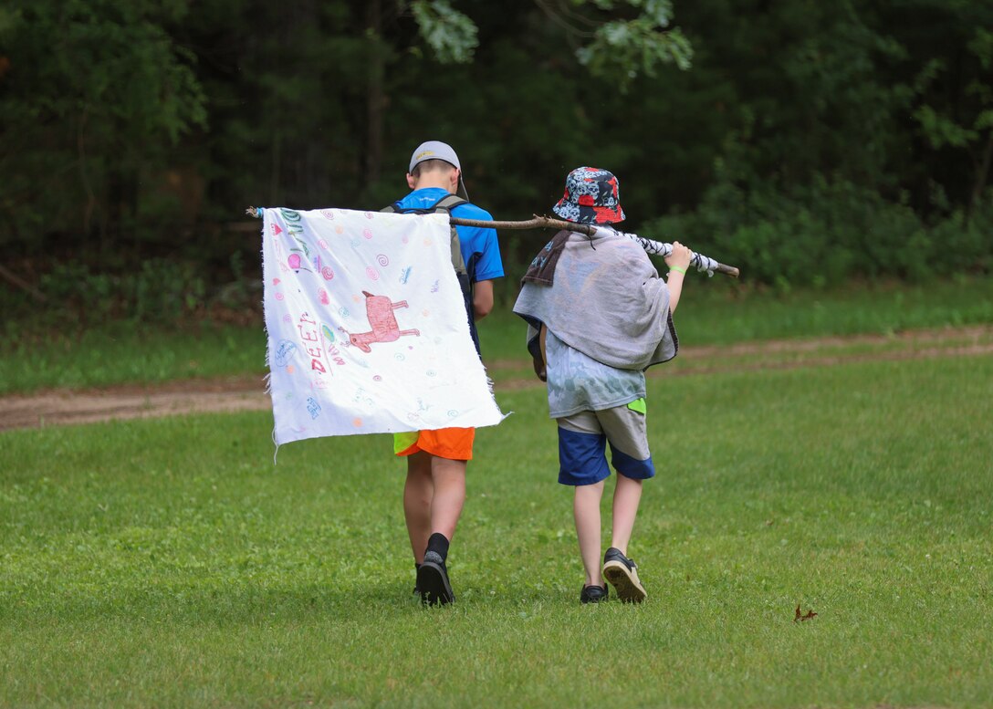 Children of Wisconsin military members enjoy comradery with their peers June 20, 2025, during the Wisconsin National Guard’s Badger Youth Camp at Camp Lakota near Wautoma, Wisconsin. The annual event, coordinated by the Wisconsin National Guard’s Child and Youth Services office, provided attending military youth a four-day experience designed to foster leadership, teamwork and resilience. (U.S. National Guard photo by Staff Sgt. Olivia Sherman)