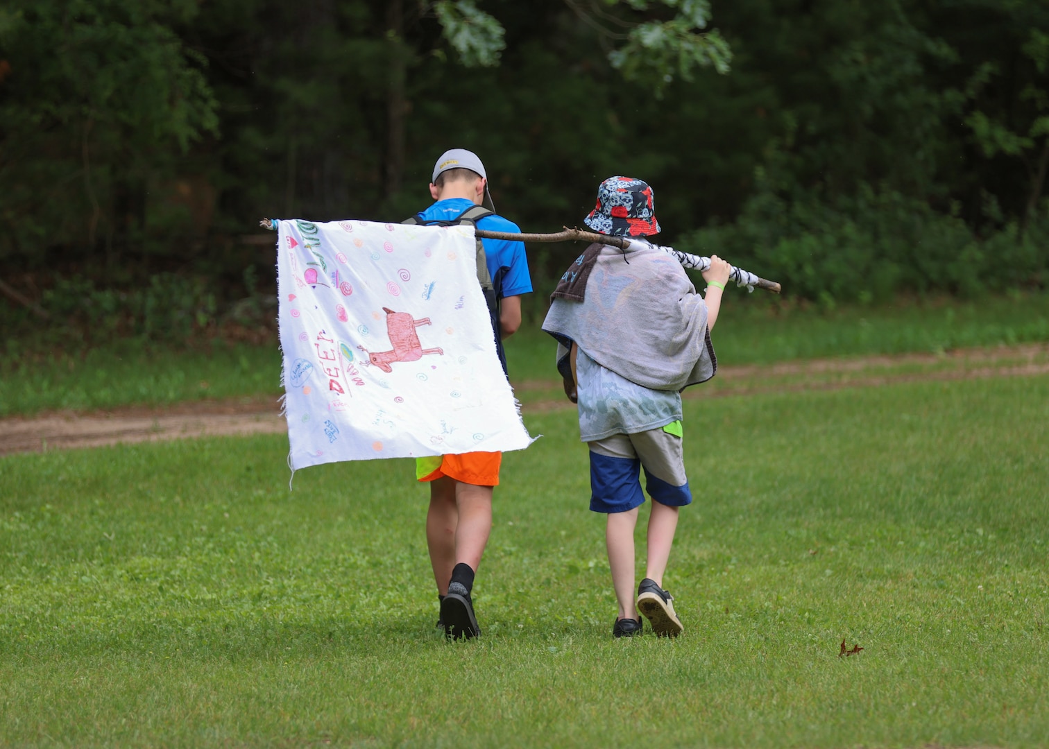 Children of Wisconsin military members enjoy comradery with their peers June 20, 2025, during the Wisconsin National Guard’s Badger Youth Camp at Camp Lakota near Wautoma, Wisconsin. The annual event, coordinated by the Wisconsin National Guard’s Child and Youth Services office, provided attending military youth a four-day experience designed to foster leadership, teamwork and resilience. (U.S. National Guard photo by Staff Sgt. Olivia Sherman)