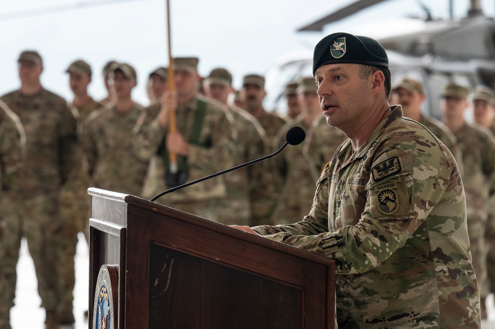 Col. Snyder address the audience during his change of command ceremony
