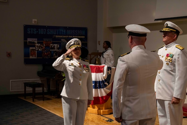 250616-N-JC800-1087 BETHESDA, Md. (June 12, 2025) - Capt. Katharine Shobe is properly relieved of command by Capt. James Corbet during the Naval Medical Leader and Professional Development Command's Change of Command Ceremony, Jun. 12. (U.S. Navy photo by Mass Communication Specialist 1st Class Heath Zeigler/Released)