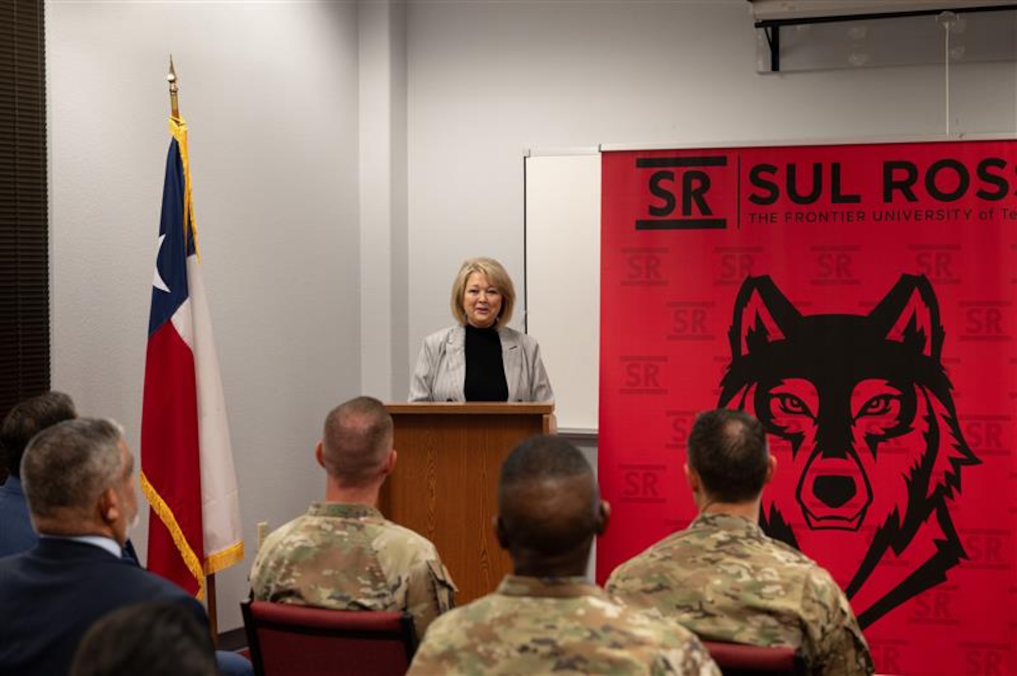 Mrs. Annette Shaw, 47th Force support Squadron force development flight chief, speaks during a partnership ceremony at Sul Ross State University in Del Rio, Texas, June 25, 2025. The ceremony marked the signing of an agreement aimed at strengthening educational collaboration between the university and Laughlin Air Force Base. (U.S. Air Force photo by Joseph Pagan)
