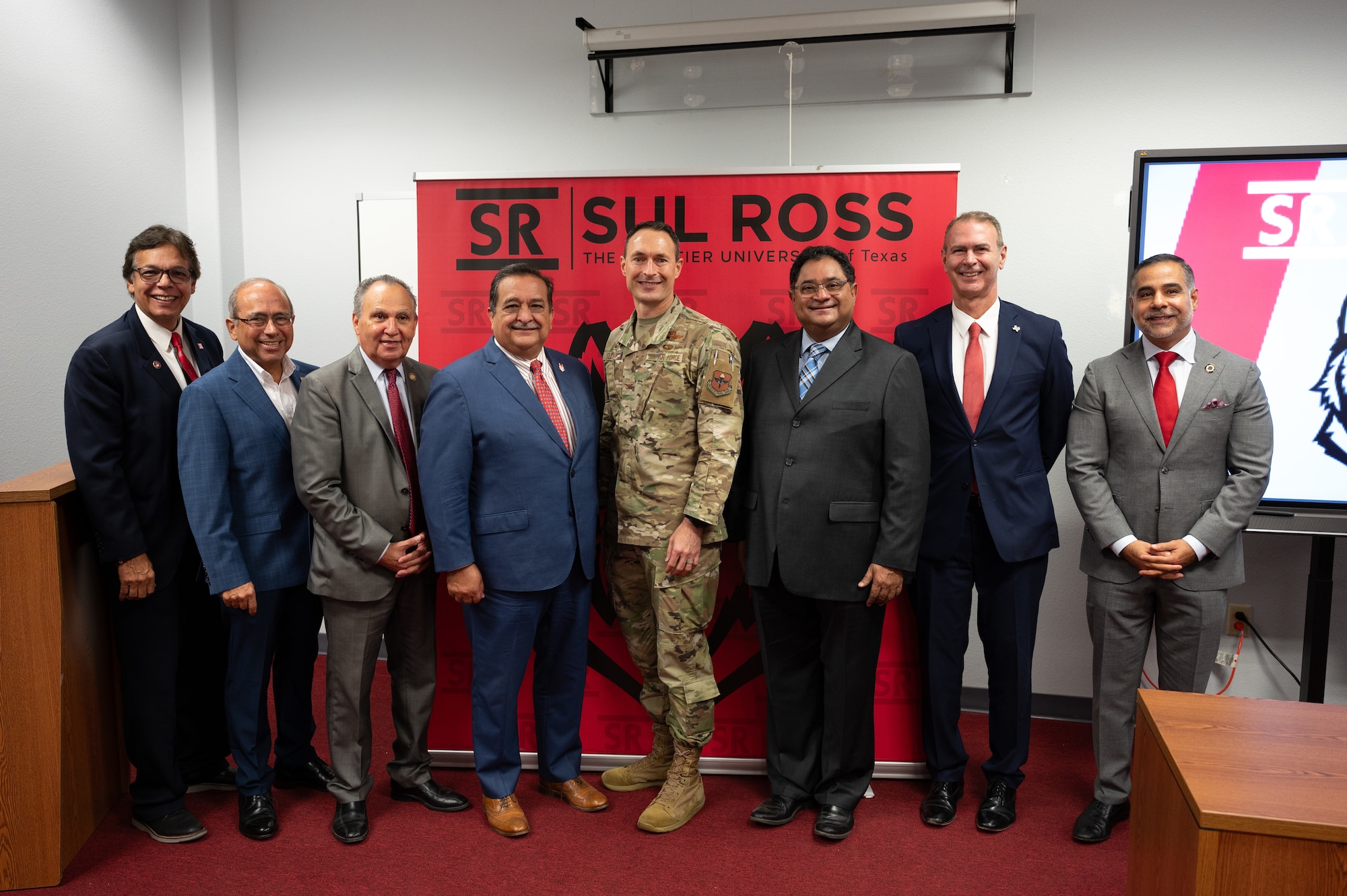 Leadership from Sul Ross State University and the 47th Flying Training Wing stand together during a partnership ceremony in Del Rio, Texas, June 25, 2025. The event highlighted continued efforts to strengthen ties between military and academic communities. (U.S. Air Force photo by Joseph Pagan)