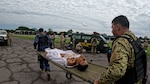 A team of El Salvador Primera Brigada Aérea members accomplish a tactical combat casualty care training exercise overseen by U.S. Air Force Airmen as part of the AMISTAD campaign June 20, 2025 in Ilopango, El Salvador. The campaign promoted cooperation between the U.S. and host nation healthcare professionals in a resource constrained environment. (U.S. Air Force photo by Tech. Sgt. Justin Norton)