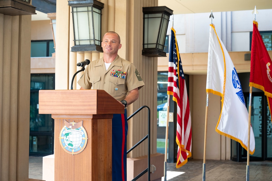 U.S. Marine Corps Sgt. Major Eric Cook assumes responsibility as the U.S. Indo-Pacific Command senior enlisted leader during an Assumption of Responsibility Ceremony at USINDOPACOM headquarters on Camp H.M. Smith, in Honolulu, June 26, 2025.