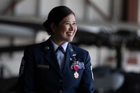 Chief Master Sgt. Kim T. Groat relinquishes the position of the State Command Chief Master Sergeant of the Alaska Air National Guard to Chief Master Sgt. Jeffrey A. Ling during a change of responsibility ceremony at Joint Base Elmendorf-Richardson, Alaska, June 18, 2025. Brig. Gen. Brian D. Kile, the commander of the Alaska Air National Guard, presided over the ceremony.