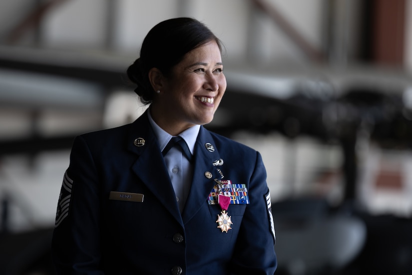Chief Master Sgt. Kim T. Groat relinquishes the position of the State Command Chief Master Sergeant of the Alaska Air National Guard to Chief Master Sgt. Jeffrey A. Ling during a change of responsibility ceremony at Joint Base Elmendorf-Richardson, Alaska, June 18, 2025. Brig. Gen. Brian D. Kile, the commander of the Alaska Air National Guard, presided over the ceremony.