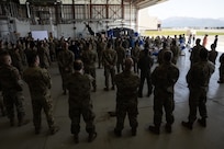 Chief Master Sgt. Kim T. Groat relinquishes the position of the State Command Chief Master Sergeant of the Alaska Air National Guard to Chief Master Sgt. Jeffrey A. Ling during a change of responsibility ceremony at Joint Base Elmendorf-Richardson, Alaska, June 18, 2025. Brig. Gen. Brian D. Kile, the commander of the Alaska Air National Guard, presided over the ceremony.