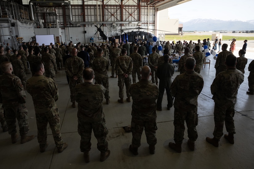 Chief Master Sgt. Kim T. Groat relinquishes the position of the State Command Chief Master Sergeant of the Alaska Air National Guard to Chief Master Sgt. Jeffrey A. Ling during a change of responsibility ceremony at Joint Base Elmendorf-Richardson, Alaska, June 18, 2025. Brig. Gen. Brian D. Kile, the commander of the Alaska Air National Guard, presided over the ceremony.