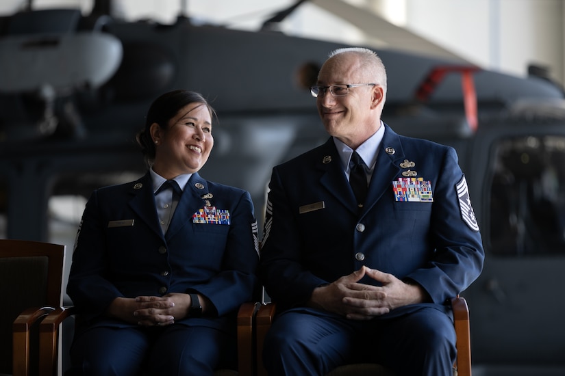 Chief Master Sgt. Kim T. Groat relinquishes the position of the State Command Chief Master Sergeant of the Alaska Air National Guard to Chief Master Sgt. Jeffrey A. Ling during a change of responsibility ceremony at Joint Base Elmendorf-Richardson, Alaska, June 18, 2025. Brig. Gen. Brian D. Kile, the commander of the Alaska Air National Guard, presided over the ceremony.