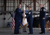 Chief Master Sgt. Kim T. Groat relinquishes the position of the State Command Chief Master Sergeant of the Alaska Air National Guard to Chief Master Sgt. Jeffrey A. Ling during a change of responsibility ceremony at Joint Base Elmendorf-Richardson, Alaska, June 18, 2025. Brig. Gen. Brian D. Kile, the commander of the Alaska Air National Guard, presided over the ceremony.