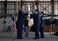 Chief Master Sgt. Kim T. Groat relinquishes the position of the State Command Chief Master Sergeant of the Alaska Air National Guard to Chief Master Sgt. Jeffrey A. Ling during a change of responsibility ceremony at Joint Base Elmendorf-Richardson, Alaska, June 18, 2025. Brig. Gen. Brian D. Kile, the commander of the Alaska Air National Guard, presided over the ceremony.