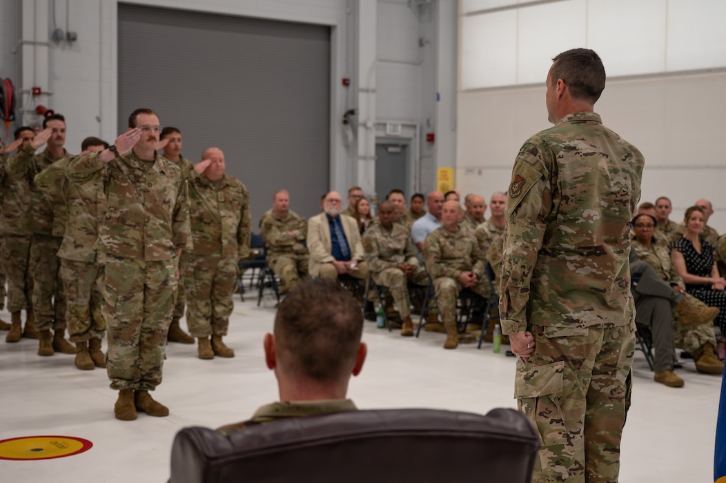 U.S. Air Force Maj. Jason Forcey, 354th Munitions Squadron outgoing commander, renders a final salute to the formation, during a change of command ceremony at Eielson Air Force Base, Alaska, June 26, 2025.