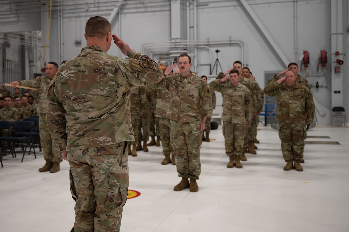 U.S. Air Force Maj. Garrett Evans, 354th Munitions Squadron incoming commander, renders an initial salute to the formation during a change of command ceremony at Eielson Air Force Base, Alaska, June 26, 2025.