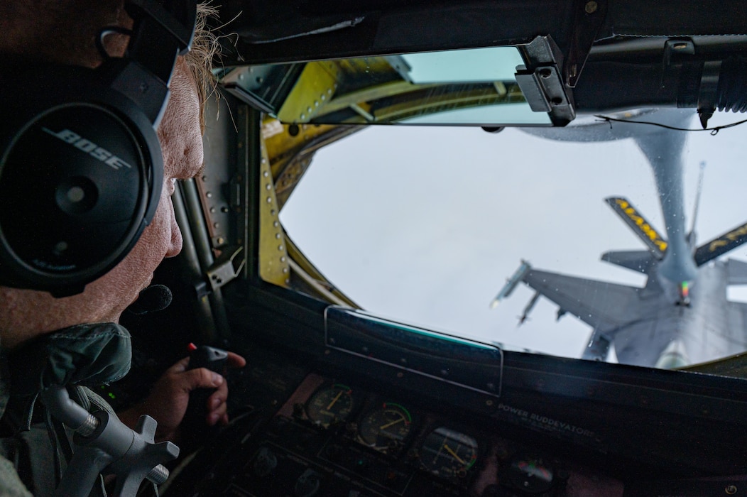 U.S. Air Force Master Sgt. Luke Sjoblom, 168th Air Refueling Squadron boom pump operator, refuels an U.S. Air Force, 35th Fighter Squadron “Pantons”, F-16C Fighting Falcon refuels from a 168 ARS KC-135 Stratotanker during Red Flag-Alaska 25-2 at Eielson Air Force Base, Alaska, June 25, 2025.