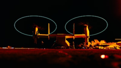 U.S. 7TH FLEET AREA OF RESPONSIBILITY (June 23, 2025) — A CMV-22B Osprey, attached to Fleet Logistics Support Squadron (VRM) 30, readies for takeoff on the flight deck of Nimitz-class aircraft carrier USS George Washington (CVN 73) while underway in...