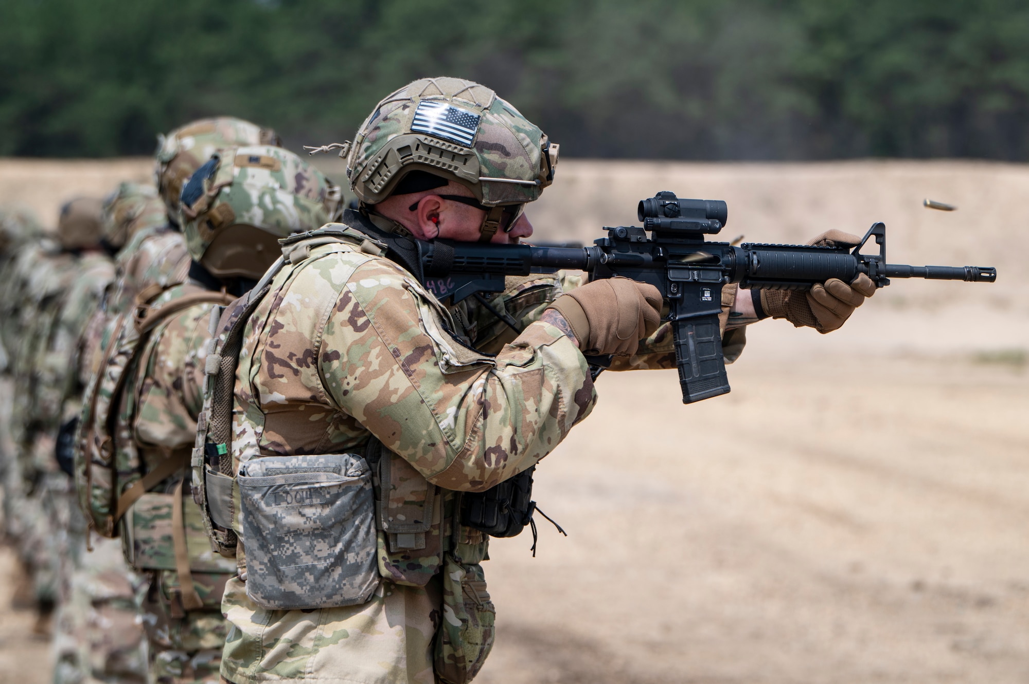 Airmen conduct weapons training outside