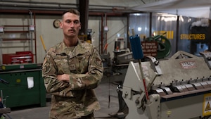 U.S. Air Force Staff Sgt. Matthew Hensel, 51st Civil Engineer Squadron non-commissioned officer in charge of metals, poses for a photo at Osan Air Base, Republic of Korea, June 25, 2025. Hensel was recognized as Mustang of the Week for his outstanding performance as NCOIC of metals where he led teams of Airmen on multiple projects on base. (U.S. Air Force photo by Senior Airman Rome Bowermaster)