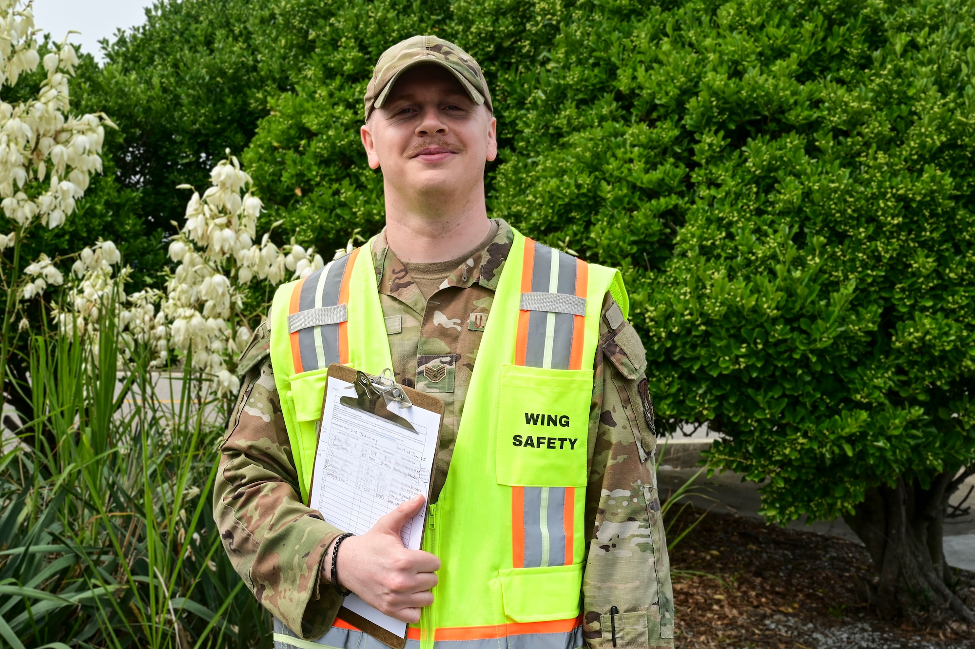 U.S. Air Force Staff Sgt. Tyler Plourde, 8th Fighter Wing noncommissioned officer in charge of occupational safety, poses for a photo outside the 8th FW headquarters, Kunsan Air Base, Republic of Korea, June 27, 2025.