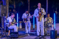 U.S. Naval Forces Europe and Africa Band performs at the cultural dinner in Pointe aux Piments, Mauritius, June 24, 2025. The NAVEURAF Band played throughout the African Maritime Forces Summit alongside the Mauritius Police Band, demonstrating their commitment to partnership and shared values. African Maritime Forces Summit is a summit that seeks to bring together senior leaders from African maritime forces, naval infantries, and militaries, alongside international partners, to address critical maritime security challenges facing the African continent.