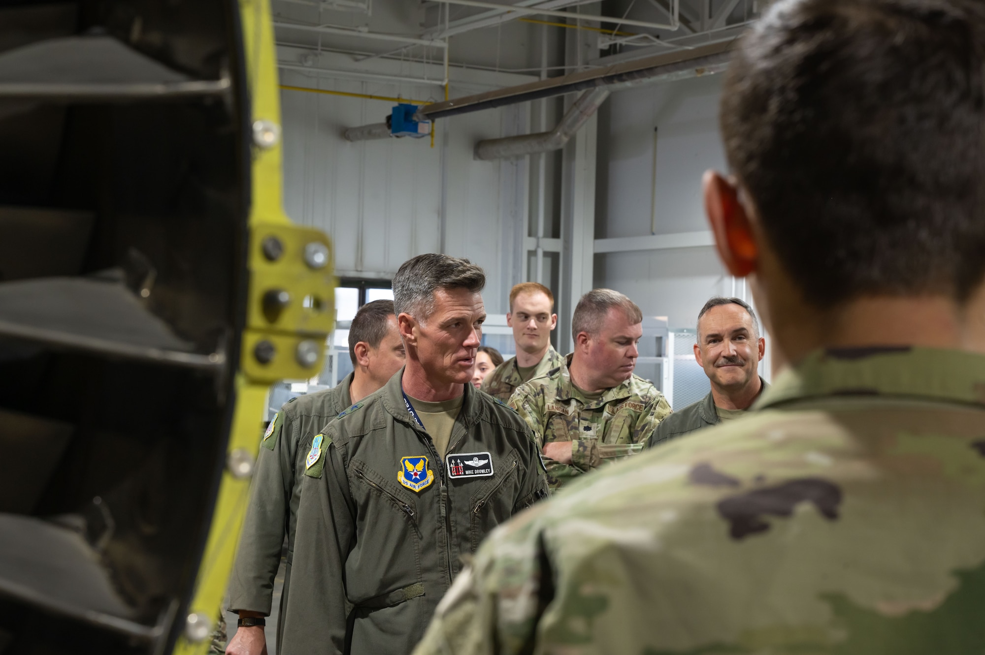 Maj. Gen. Michael Drowley arrives at a maintenance management shop.